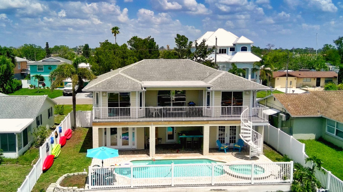 Aerial of Hudson Waterfront with its pool and dock on the canal