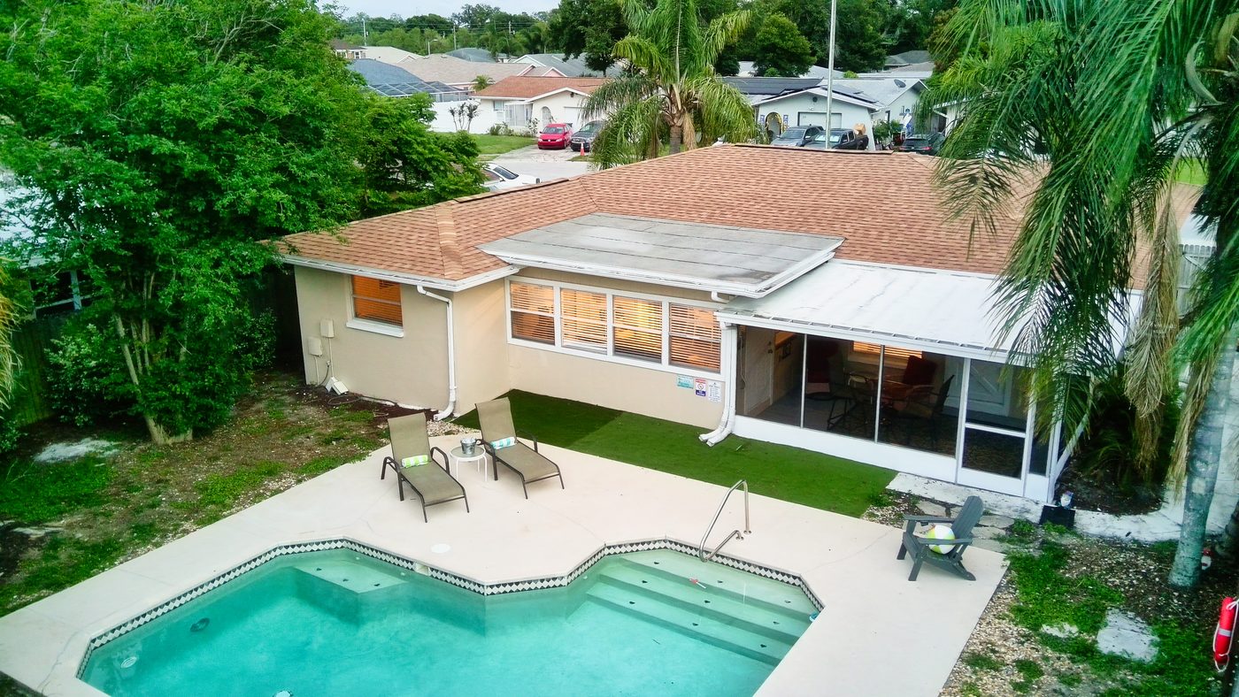 Aerial of The Cove with its pool and screened porch